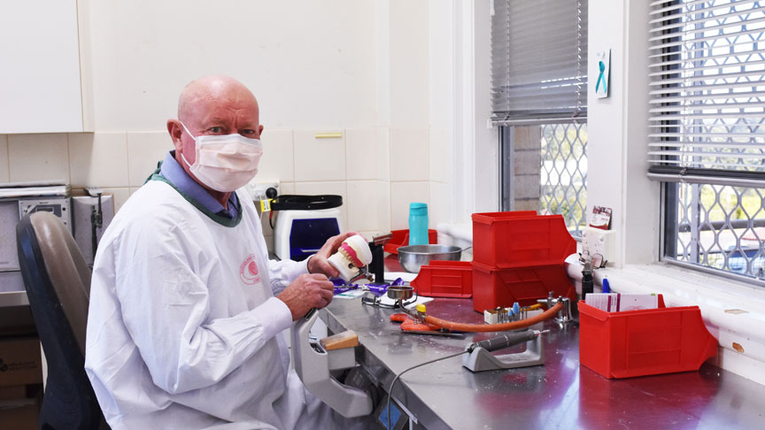 Rodney Laycock, at work at Gympie Hospital as a Dental Technician