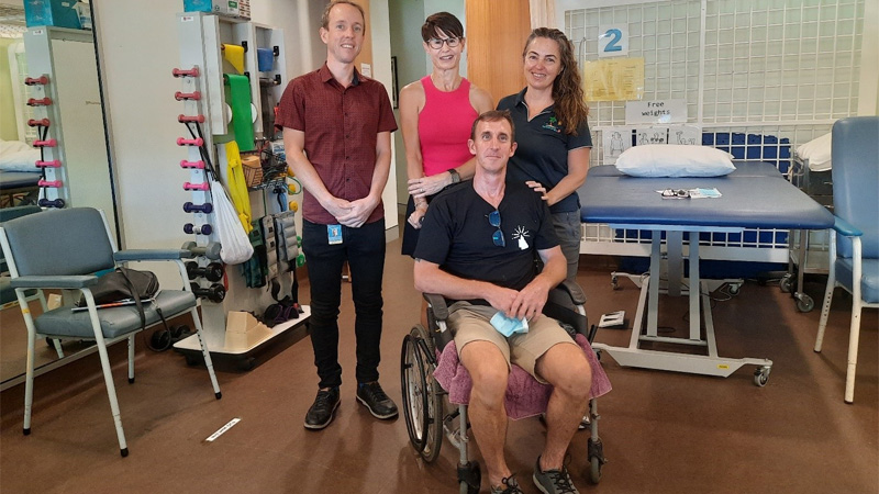 Speech pathologist Nick Hannah (left) with Bec Toogood (second from left), physiotherapist Sophie Morris (right) and Matt Follows (seated).