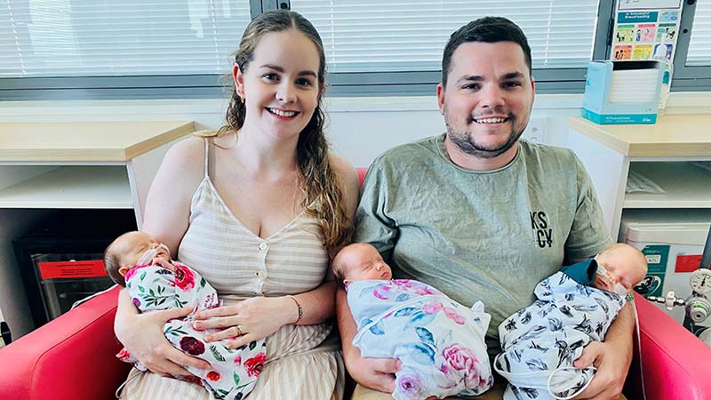 Lindsay and Simon Fernandez with their triplets.