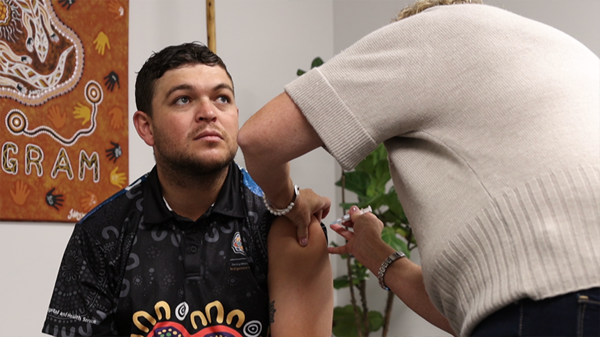 Ash Taylor receiving his flu vaccination