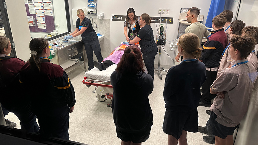 Students from Chinchilla State High School observing an emergency department simulation.